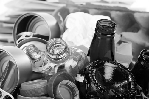 Commercial waste crew preparing for collection with safety gear